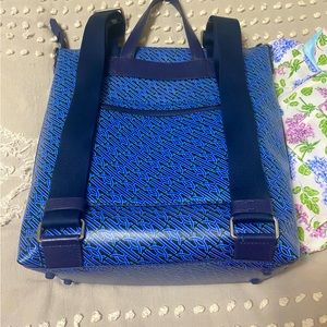 Cole Haan covered leather backpack/crossbody. Like new. Only used a few times.